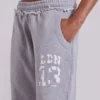 13 Pantalones de chándal Monster Joggers de corte acampanado en gris jaspeado