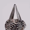 Bolso «Marza» de cuero sintético con tachuelas y estampado de cebra