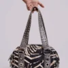 Bolso «Marza» de cuero sintético con tachuelas y estampado de cebra