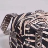 Bolso «Marza» de cuero sintético con tachuelas y estampado de cebra