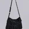 Bolso tipo cartera de denim recubierto «Drummer»