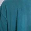 Camiseta corta con emblema