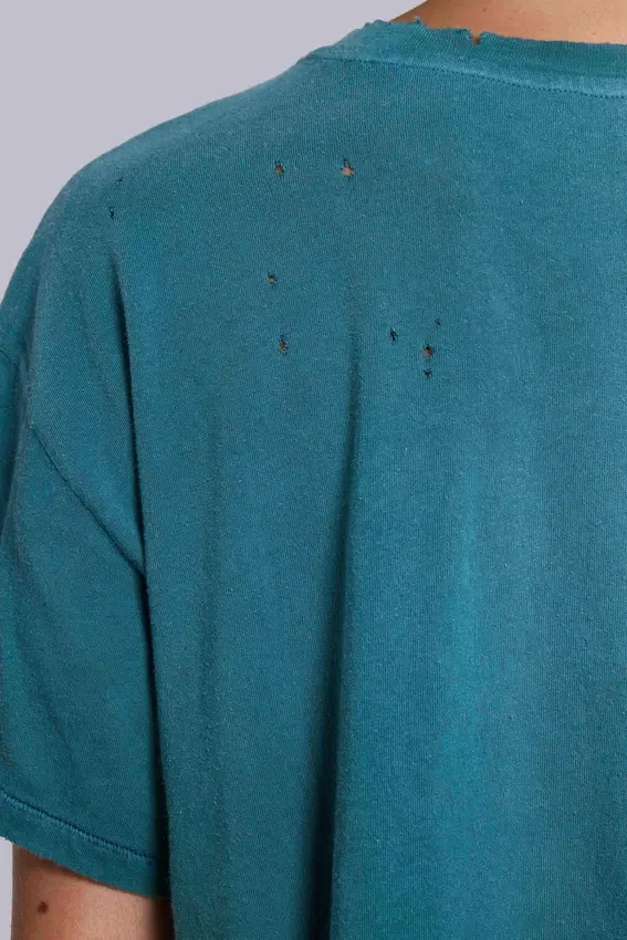 Camiseta corta con emblema