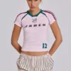 Camiseta rosa de fútbol para bebé n.º 13