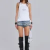 Camiseta tipo chaleco con flor de lis de strass de Rock Revival