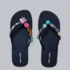 Chanclas con colgantes de joyería