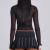 Falda plisada con tachuelas Onyx