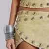 Minifalda «Vinta» de piel sintética con tachuelas