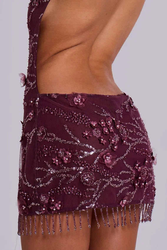 Minivestido con adornos de Ellora en color vino