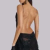 Minivestido de encaje con apliques Shadea en negro