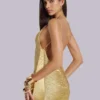 Minivestido Lavinia con flecos y espalda descubierta en dorado