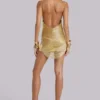 Minivestido Lavinia con flecos y espalda descubierta en dorado