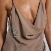 Minivestido sin espalda con adornos de Doure