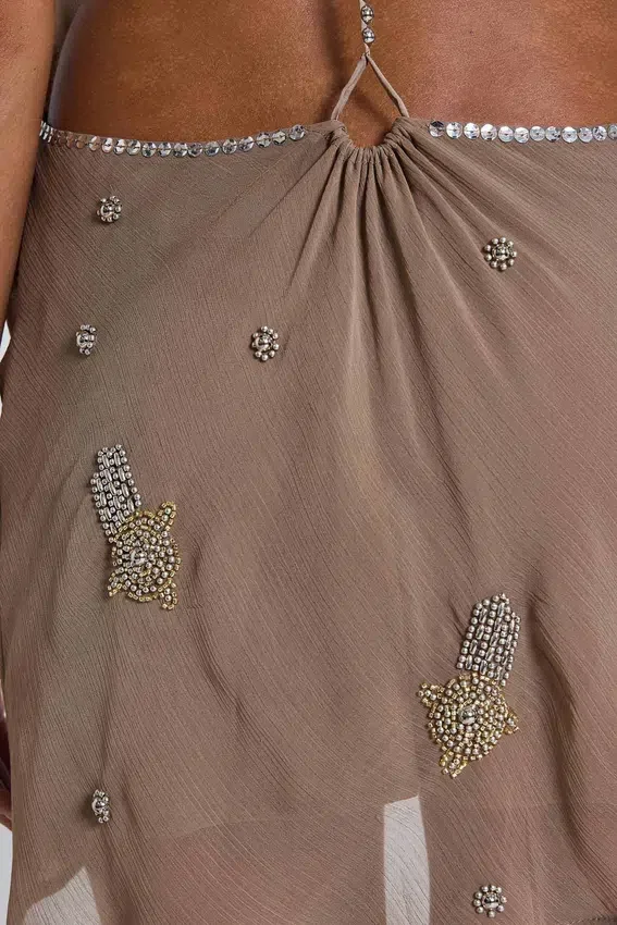 Minivestido sin espalda con adornos de Doure
