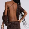 Minivestido sin espalda «Ophidian» en devoré con estampado de cebra