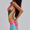 Minivestido Toryn sin espalda con rayas y lentejuelas