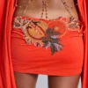 Minivestido tropical con adornos de Alula