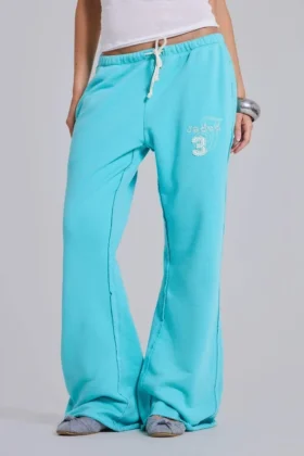 Pantalón de chándal holgado de corte acampanado Cleo en turquesa