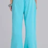 Pantalón de chándal holgado de corte acampanado Cleo en turquesa