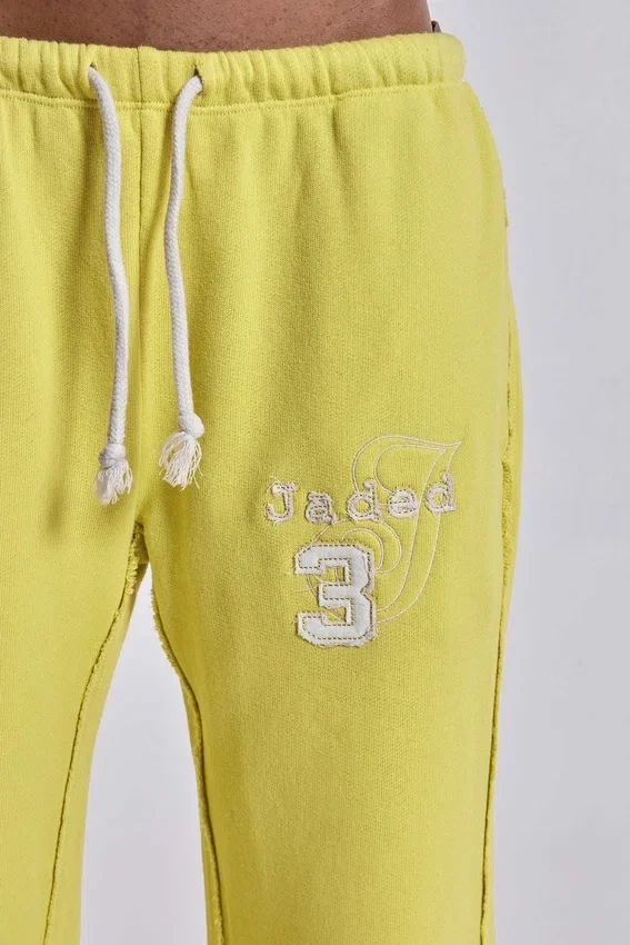 Pantalón jogger holgado de corte acampanado Cleo en color neón