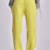 Pantalón jogger holgado de corte acampanado Cleo en color neón