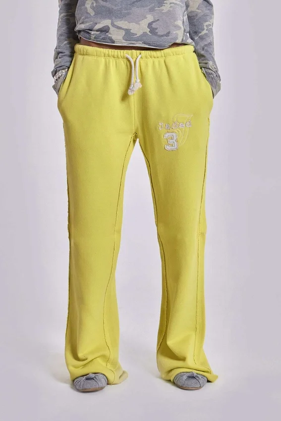 Pantalón jogger holgado de corte acampanado Cleo en color neón