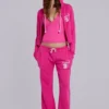 Pantalón jogger holgado de corte acampanado Cleo en rosa