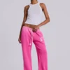 Pantalón jogger holgado de corte acampanado Cleo en rosa