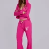 Pantalón jogger holgado de corte acampanado Cleo en rosa