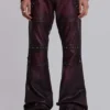 Pantalones bootcut «Drift» de imitación de piel con tachuelas en color burdeos