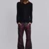 Pantalones bootcut «Drift» de imitación de piel con tachuelas en color burdeos