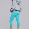 Pantalones capri «Quinn» de jersey con tachuelas en turquesa