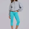Pantalones capri «Quinn» de jersey con tachuelas en turquesa