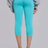 Pantalones capri «Quinn» de jersey con tachuelas en turquesa