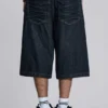 Pantalones cortos Colossus de índigo con pliegues