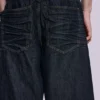 Pantalones cortos Colossus de índigo con pliegues