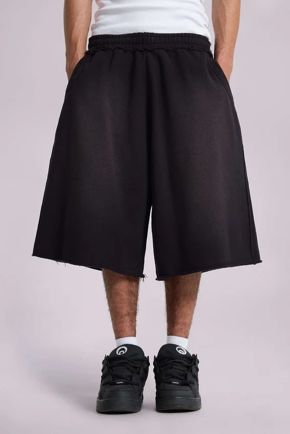 Pantalones cortos holgados de chándal «Monster Joggers» en negro lavado