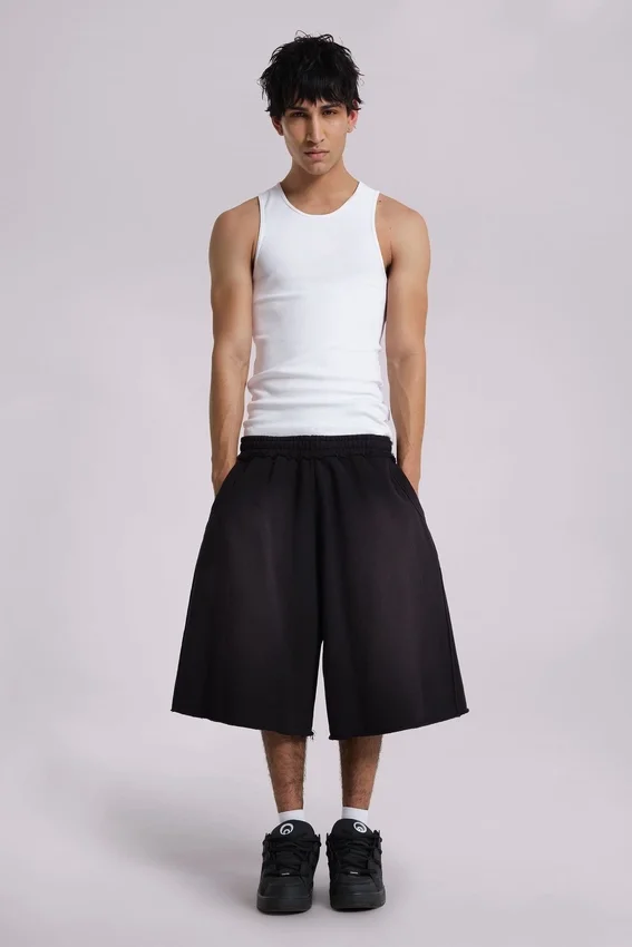 Pantalones cortos holgados de chándal «Monster Joggers» en negro lavado