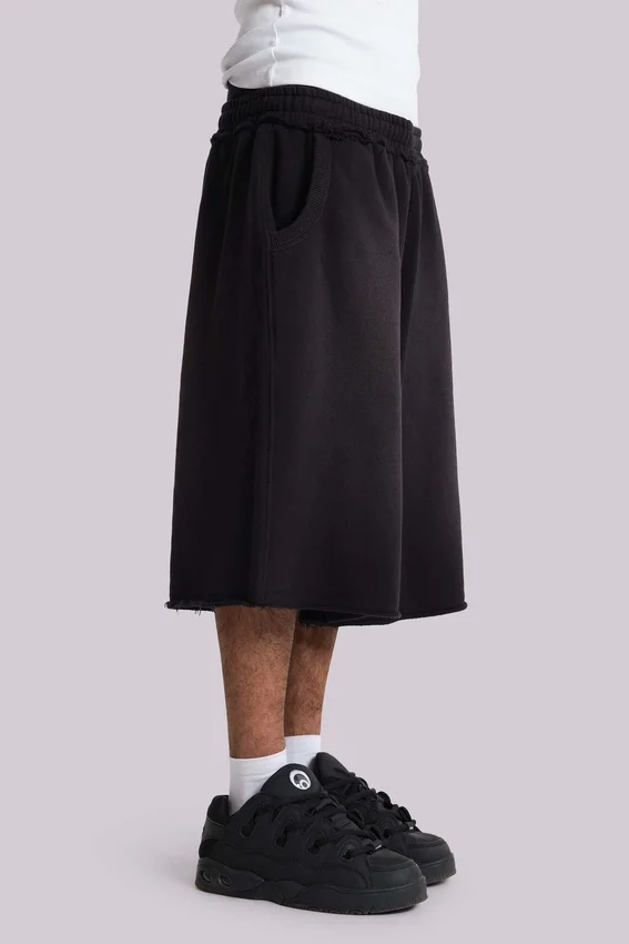 Pantalones cortos holgados de chándal «Monster Joggers» en negro lavado