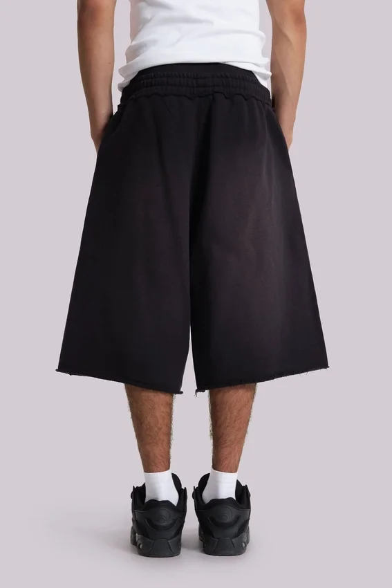 Pantalones cortos holgados de chándal «Monster Joggers» en negro lavado