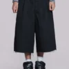 Pantalones cortos holgados Goliath negros con tachuelas, talla XL
