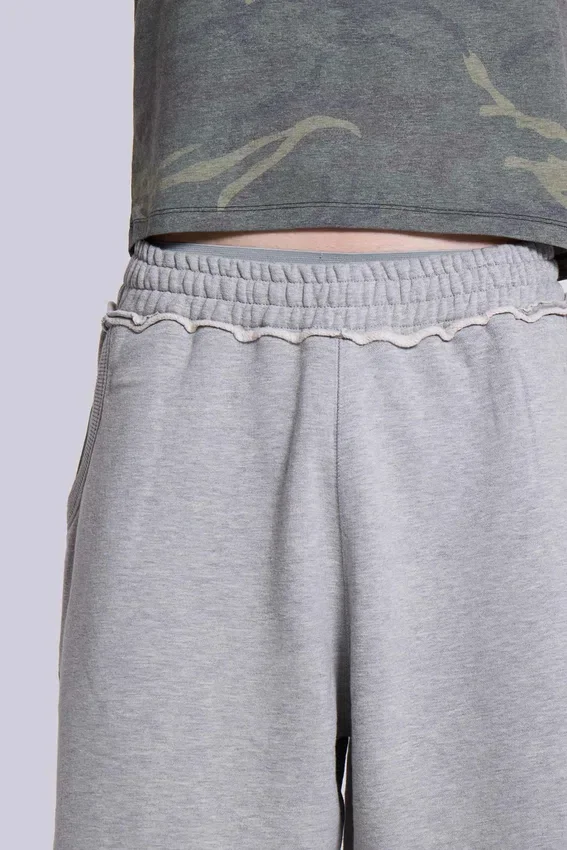 Pantalones cortos holgados tipo jogger «Monster» en gris jaspeado