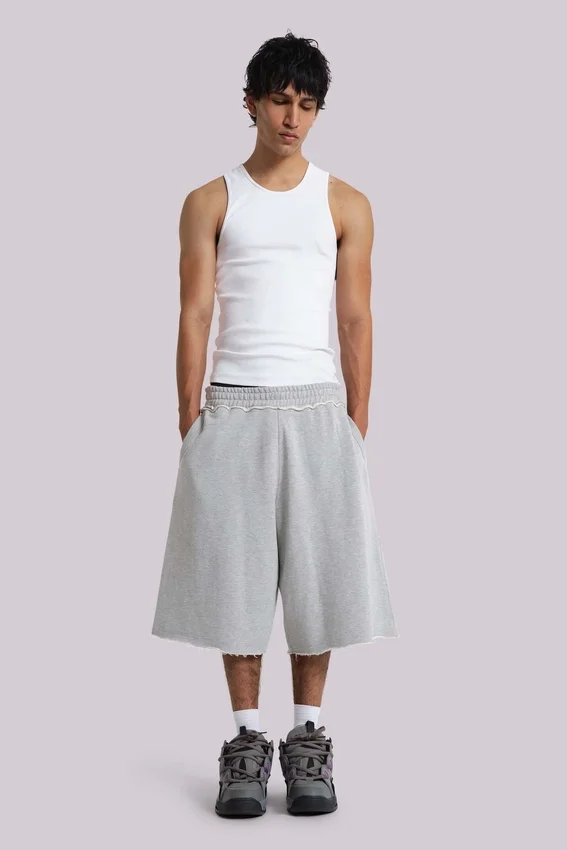 Pantalones cortos holgados tipo jogger «Monster» en gris jaspeado