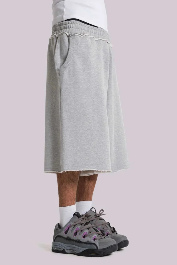 Pantalones cortos holgados tipo jogger «Monster» en gris jaspeado
