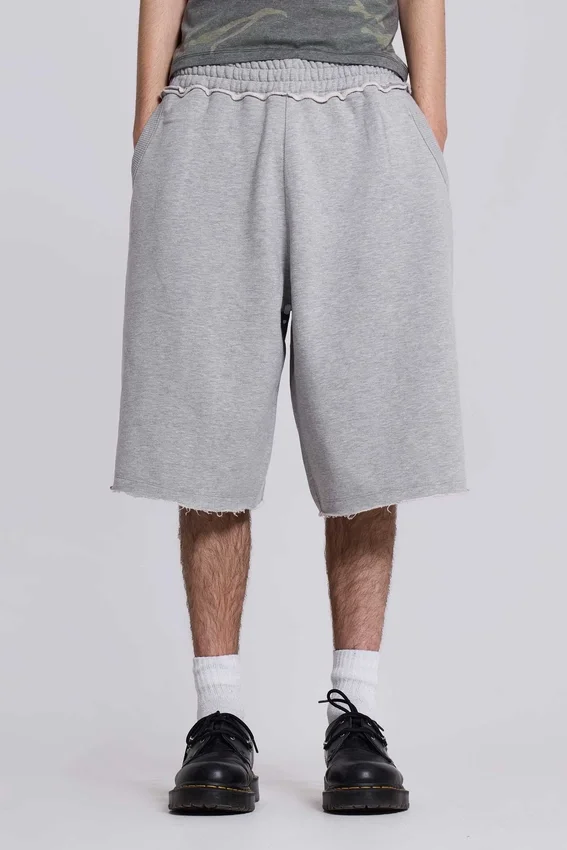 Pantalones cortos holgados tipo jogger «Monster» en gris jaspeado