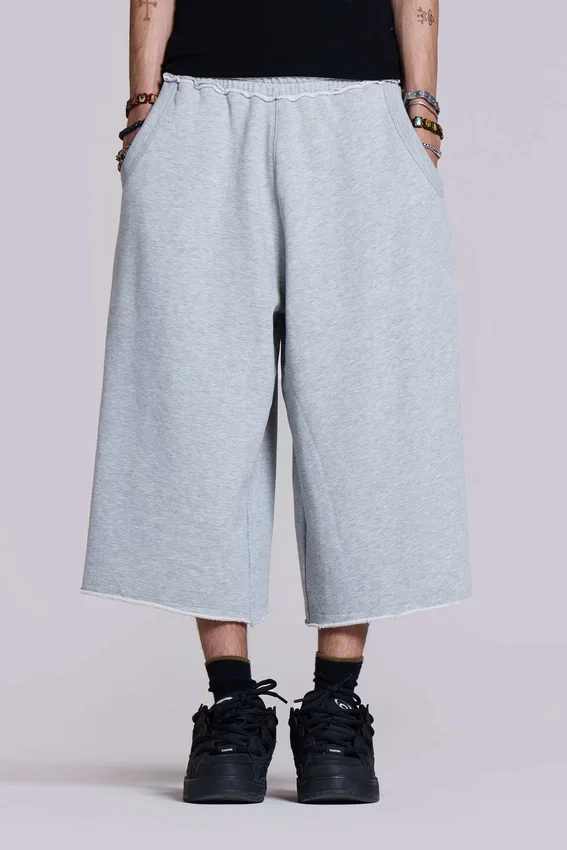 Pantalones cortos Monster de 3/4 en gris jaspeado