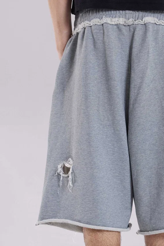Pantalones cortos «Monster» grises desgastados