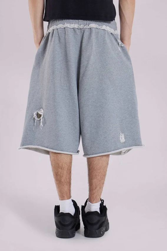 Pantalones cortos «Monster» grises desgastados