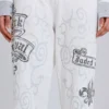 Pantalones de chándal con estampado «Rock Revival» y tachuelas