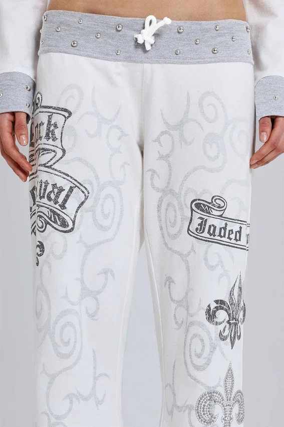 Pantalones de chándal con estampado «Rock Revival» y tachuelas